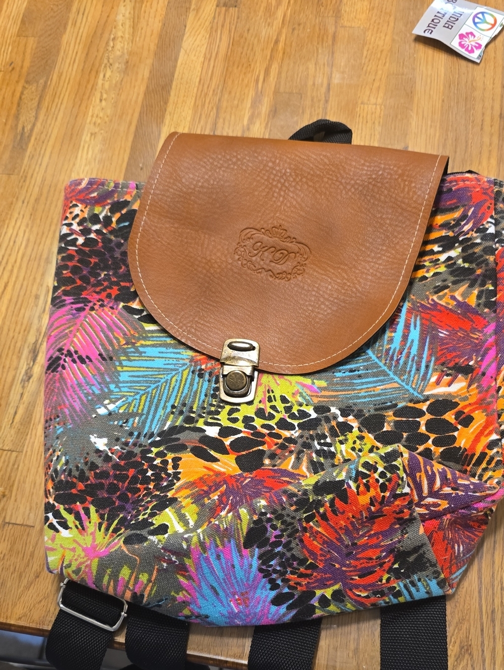 Brown Leather-Flap Tropical Print Backpack